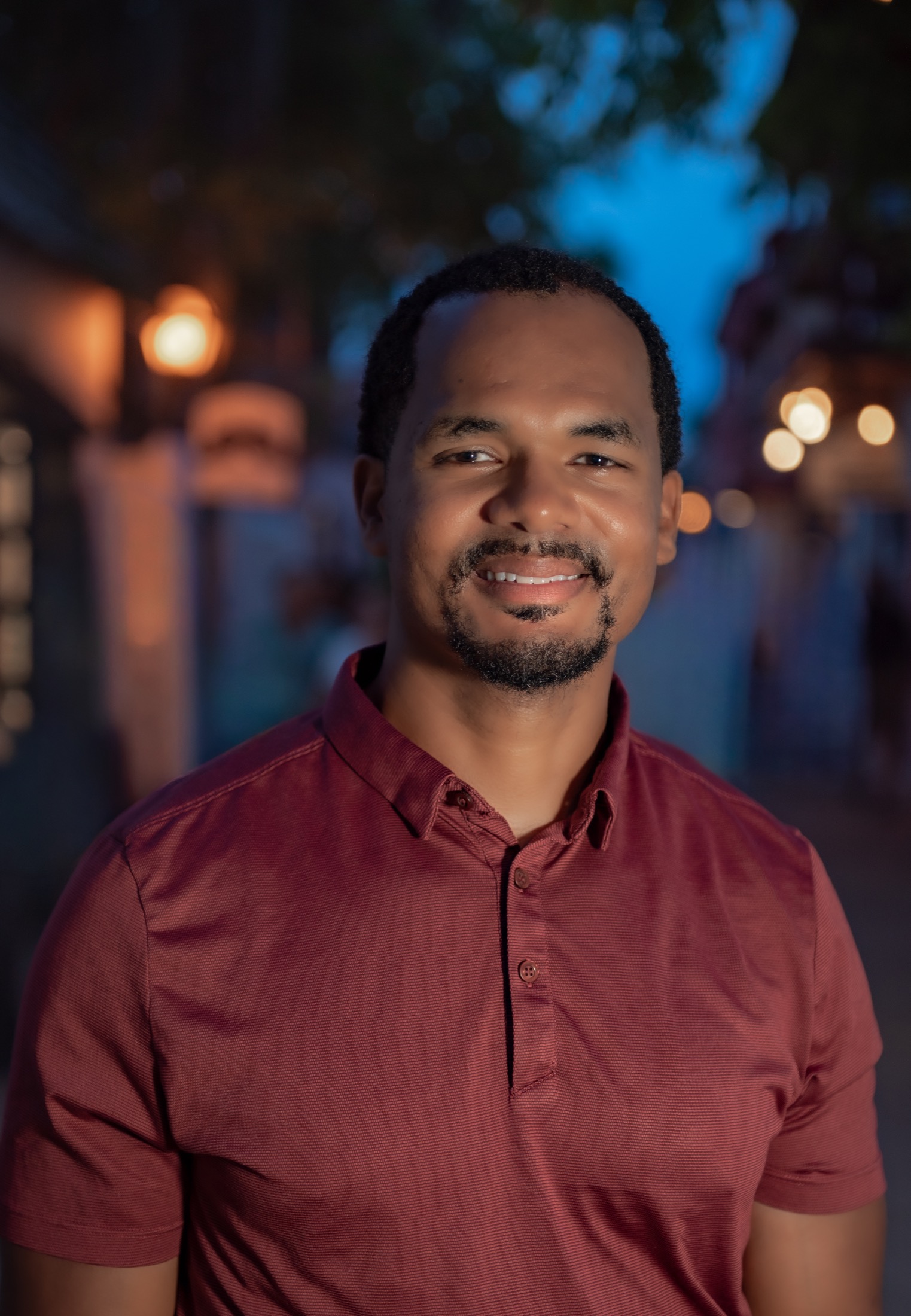 Approachable evening headshot of a South Florida business professional
