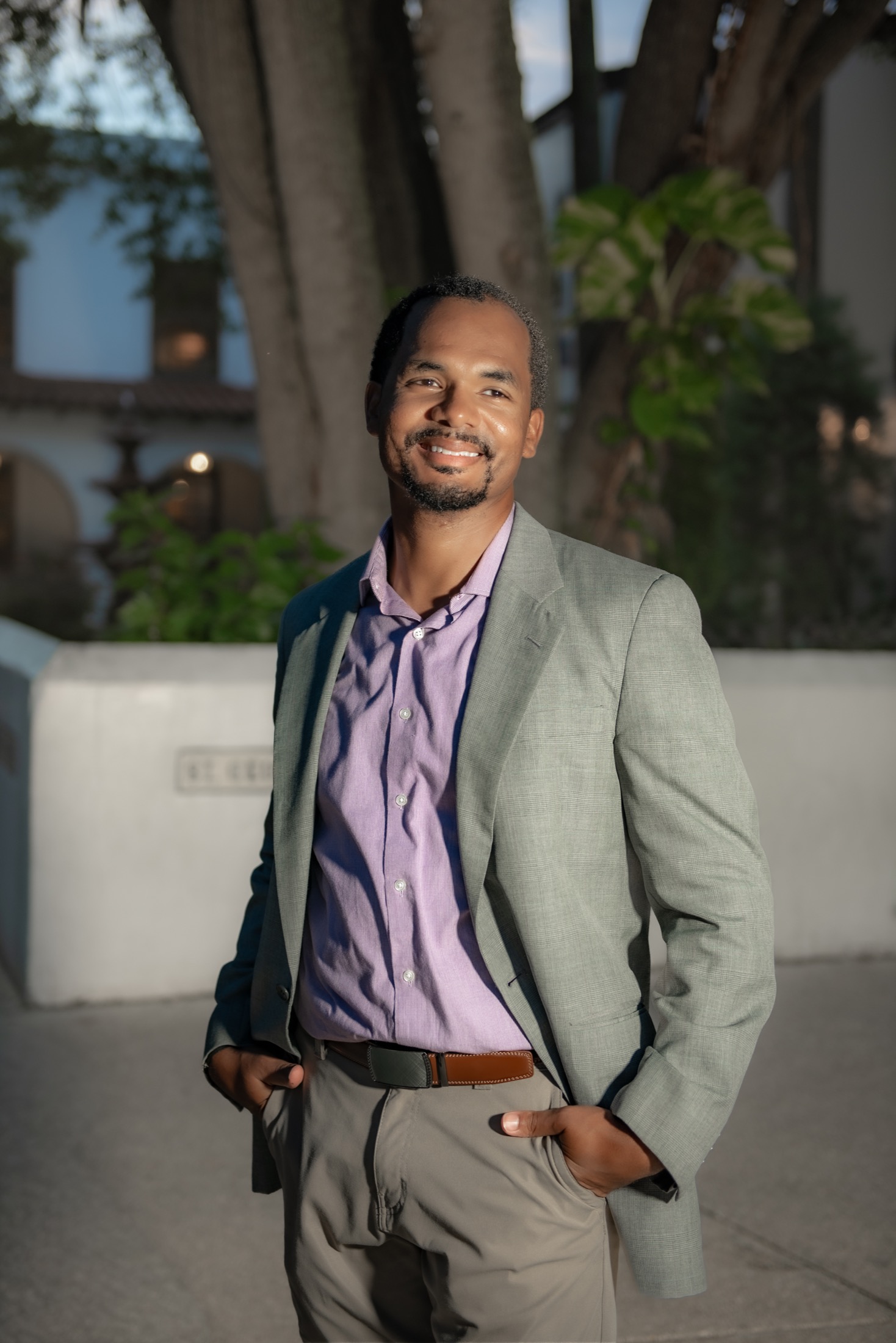 South Florida professional photographed outdoors in a suit for his personal brand