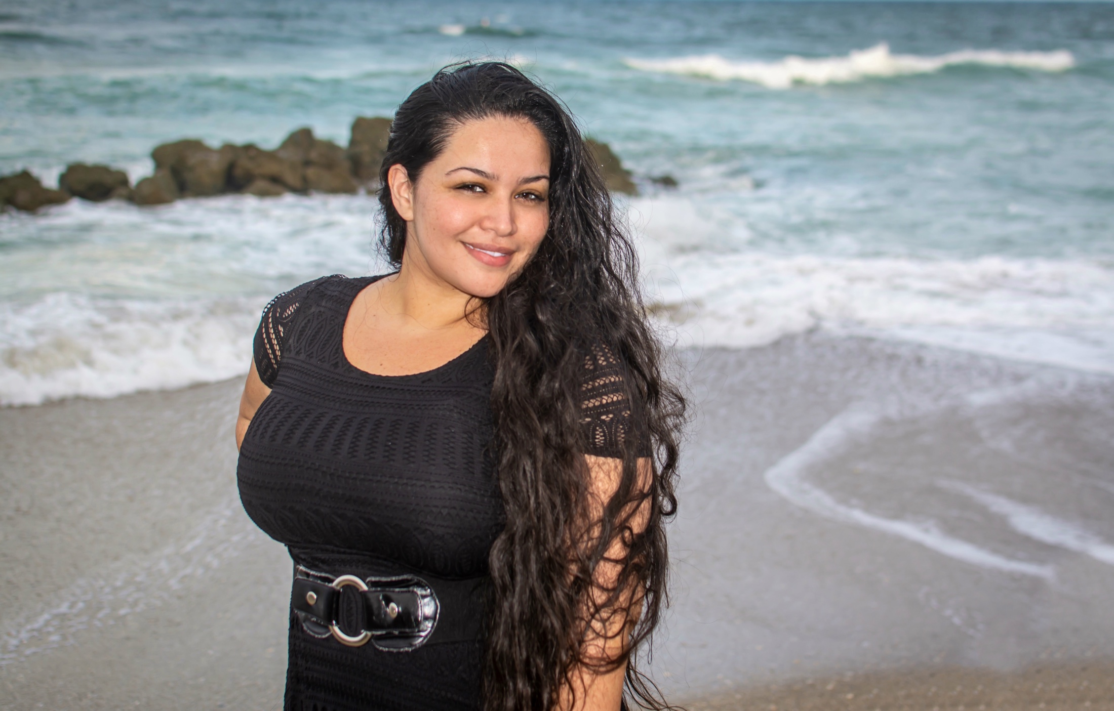 Karli Santana beside the ocean during the early years of Photos by Karli