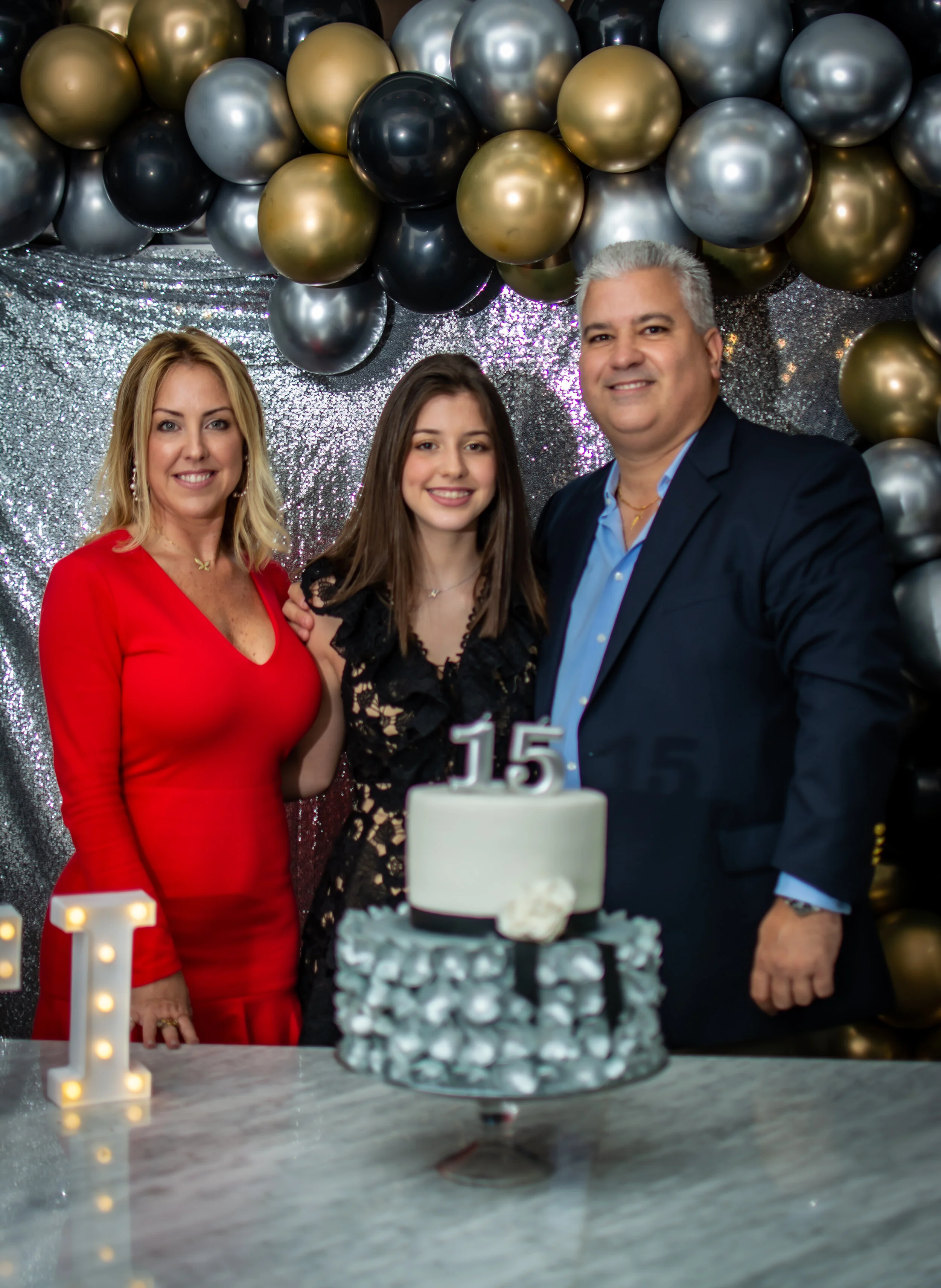 Quinceañera portraits, family, details, and celebration photography by Photos by Karli
