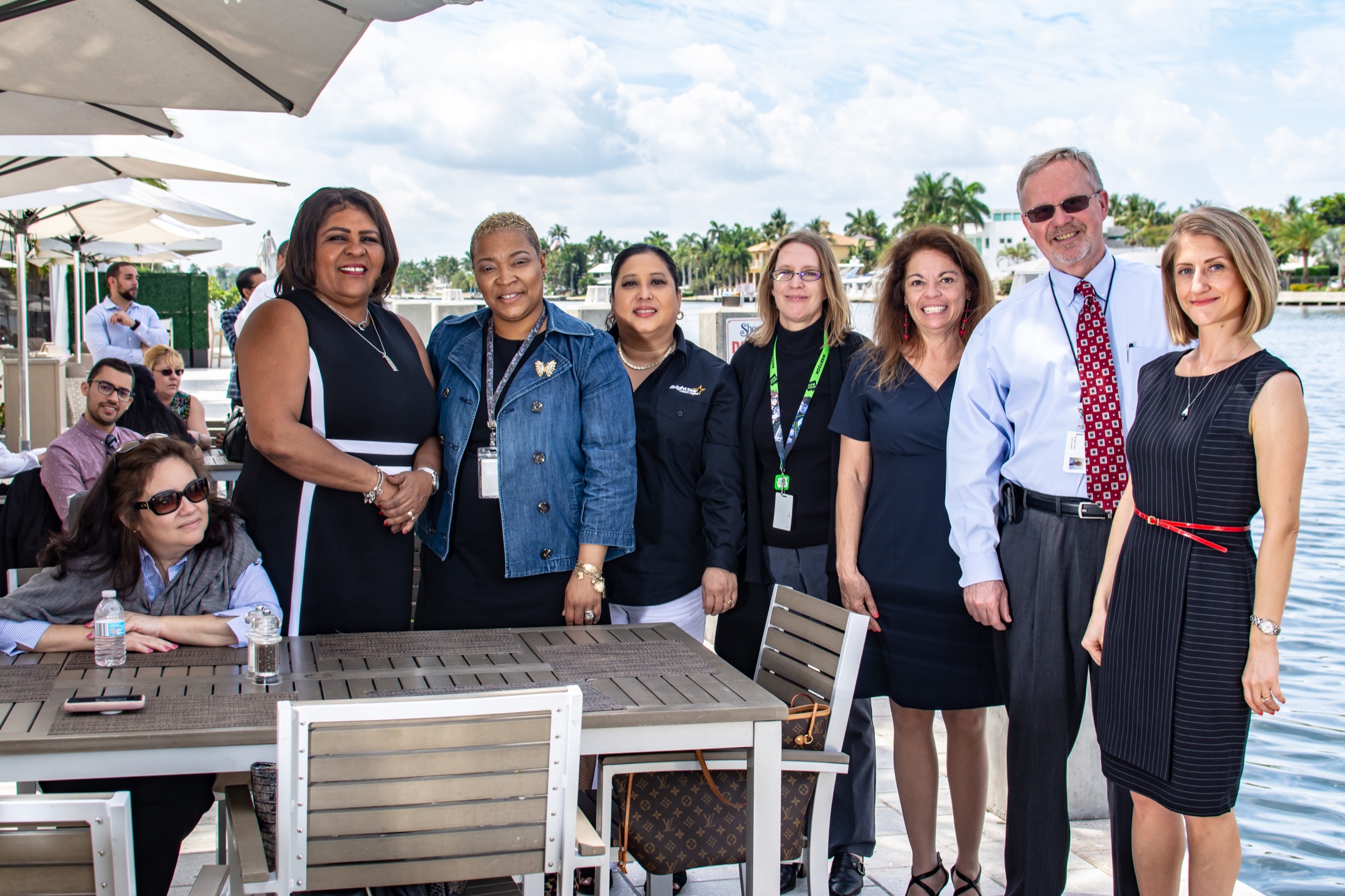 Business team portrait during a South Florida waterfront event