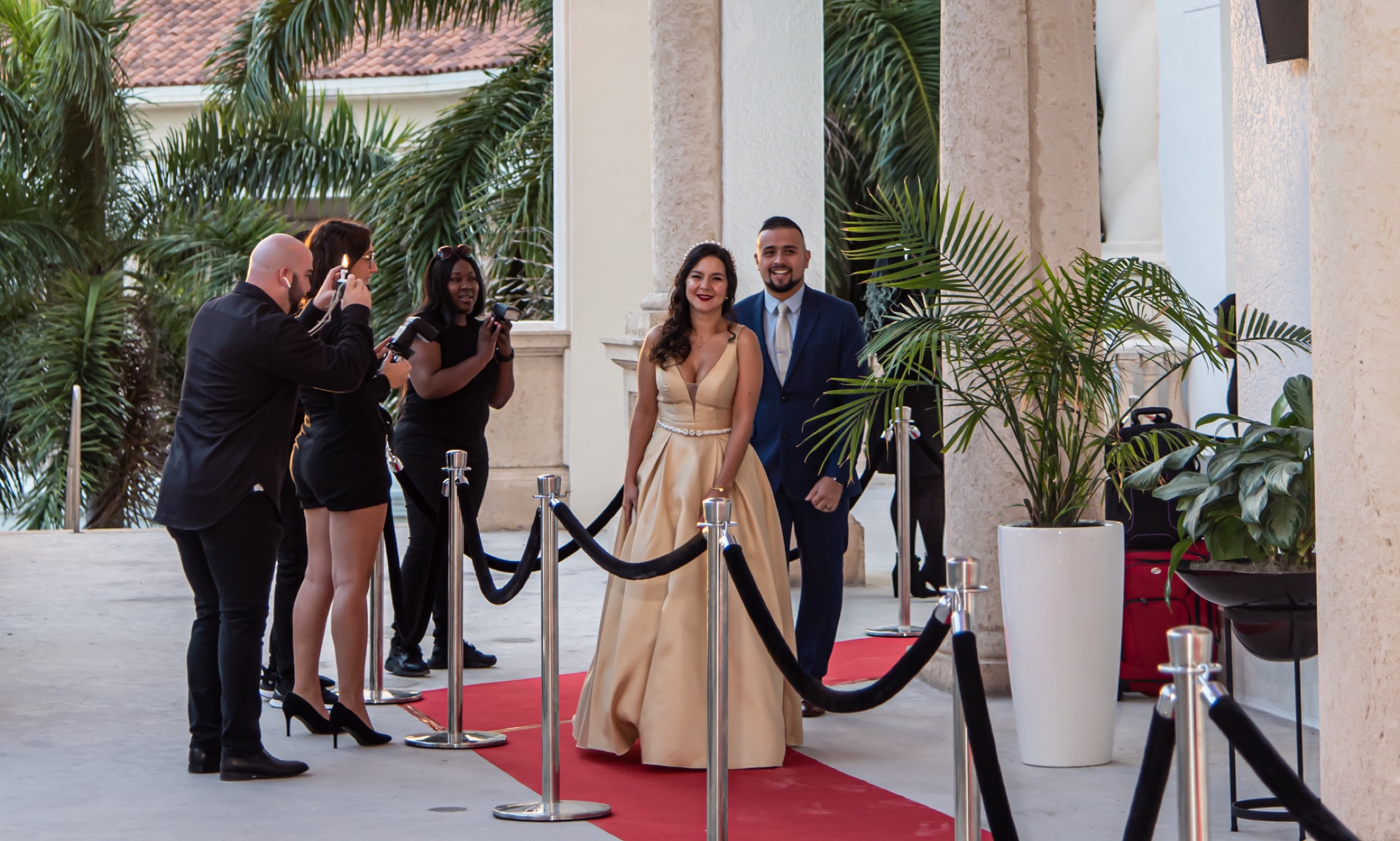 Corporate gala guests arriving on a red carpet
