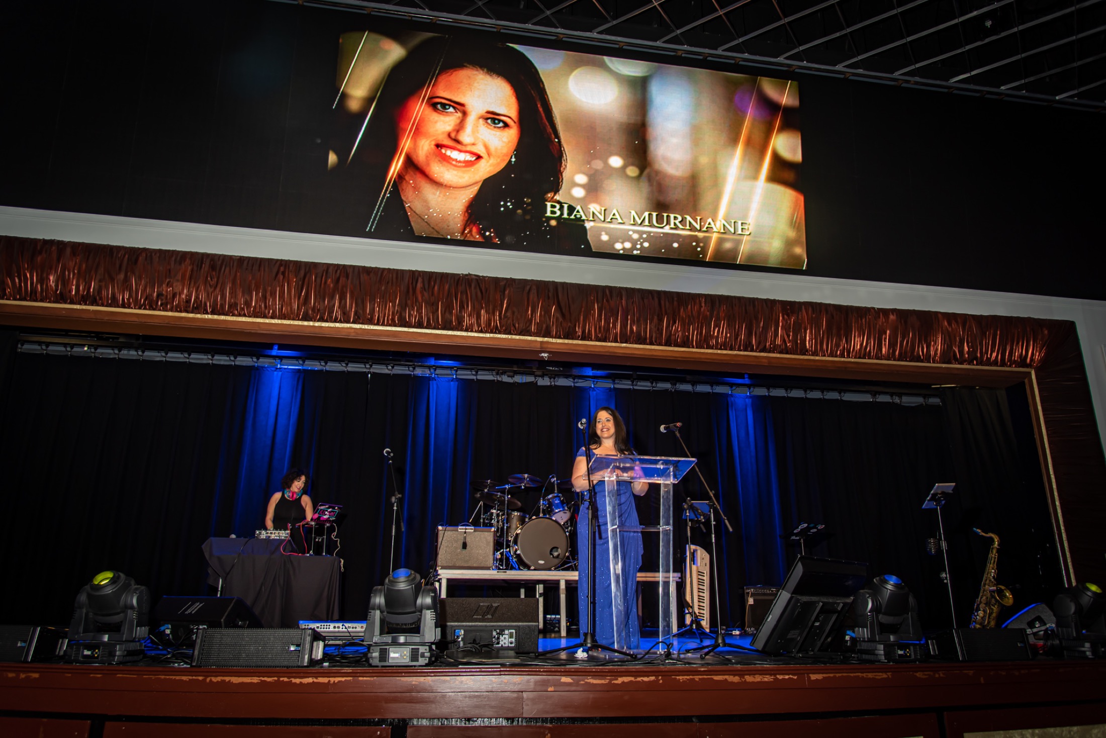 Executive speaking from the stage at a company gala