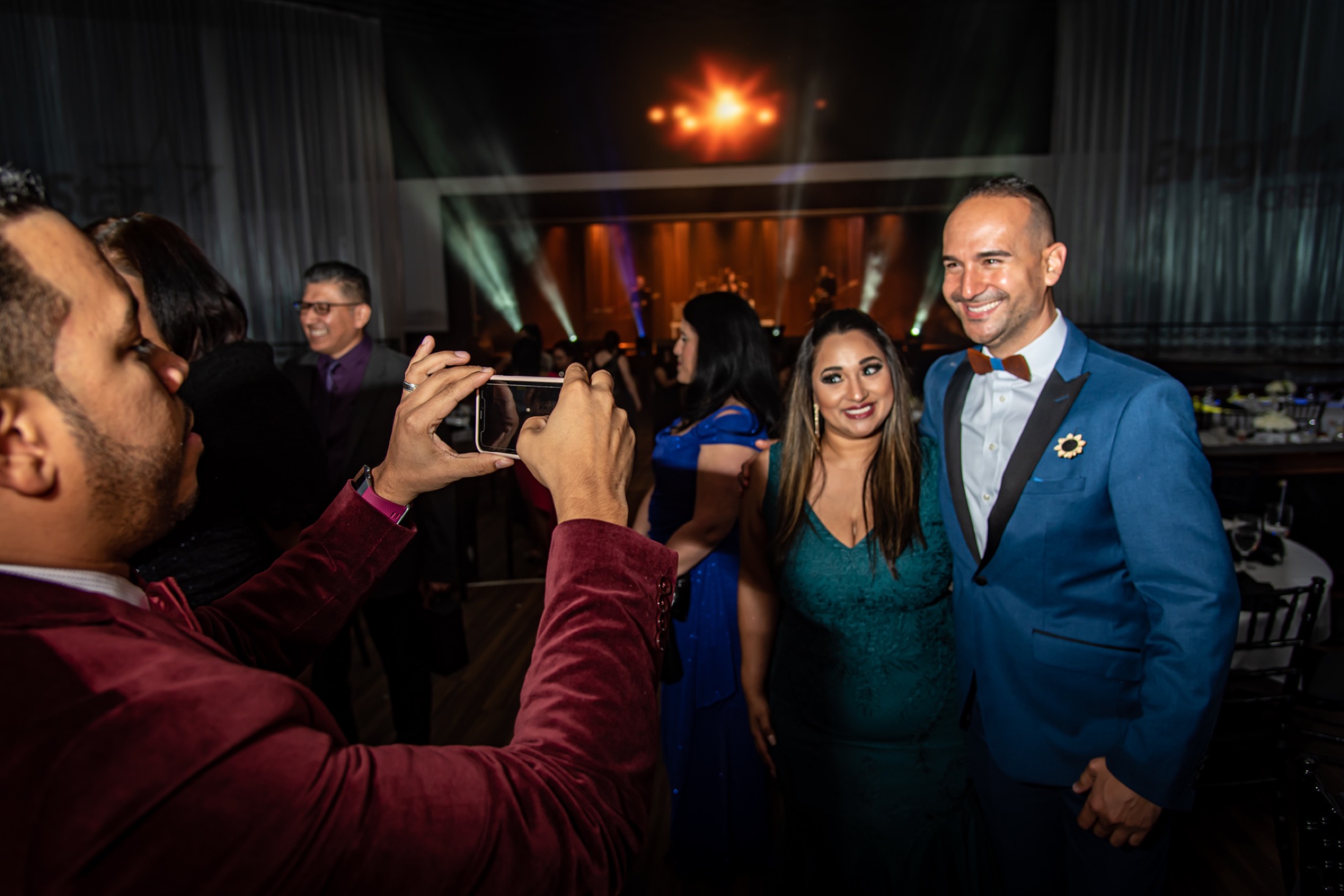 Guests taking a photograph together during a corporate gala